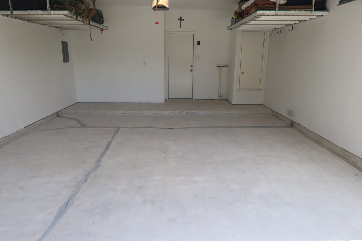 Concrete surface preparation and crack repair